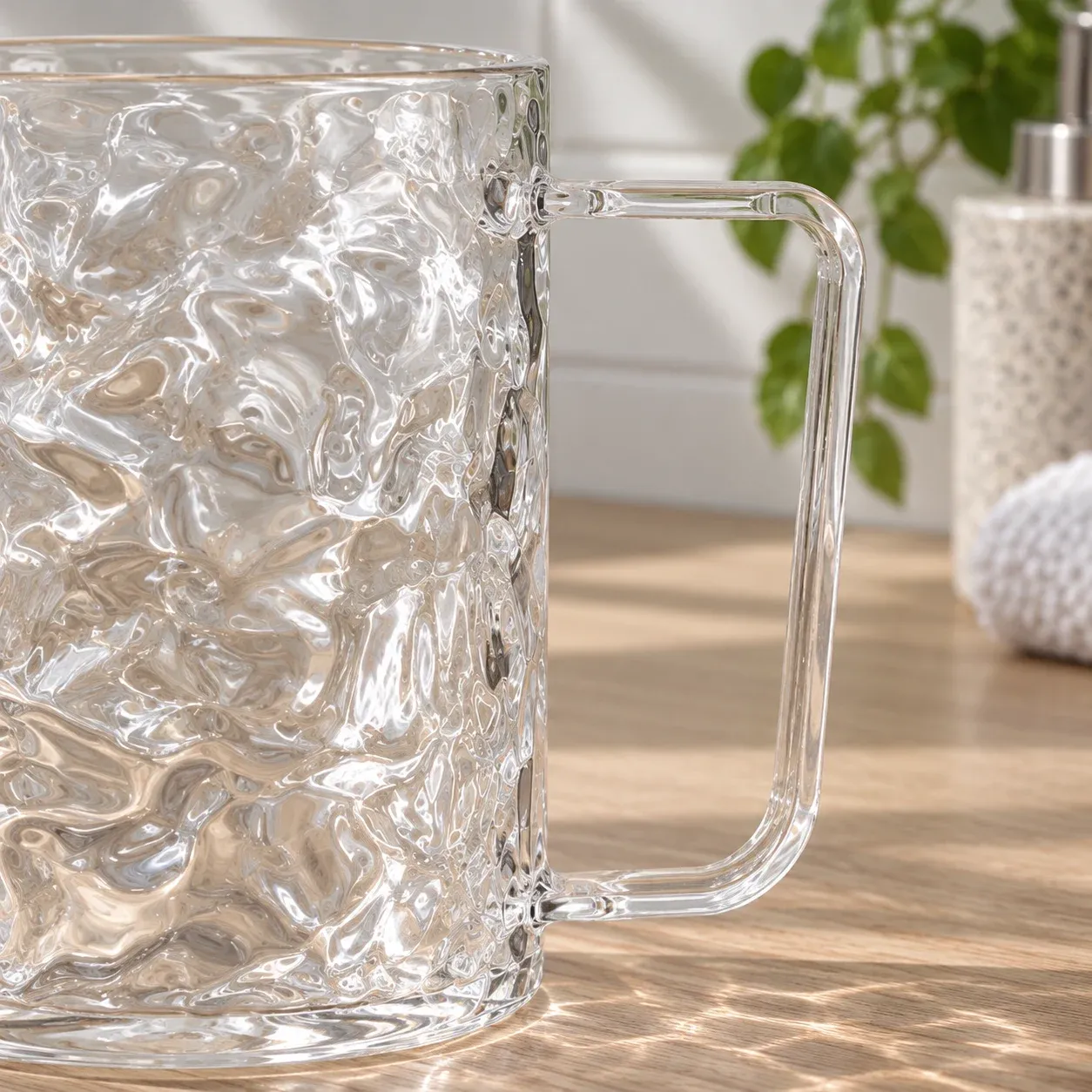 Close view of the clear open handle and ripple-textured body